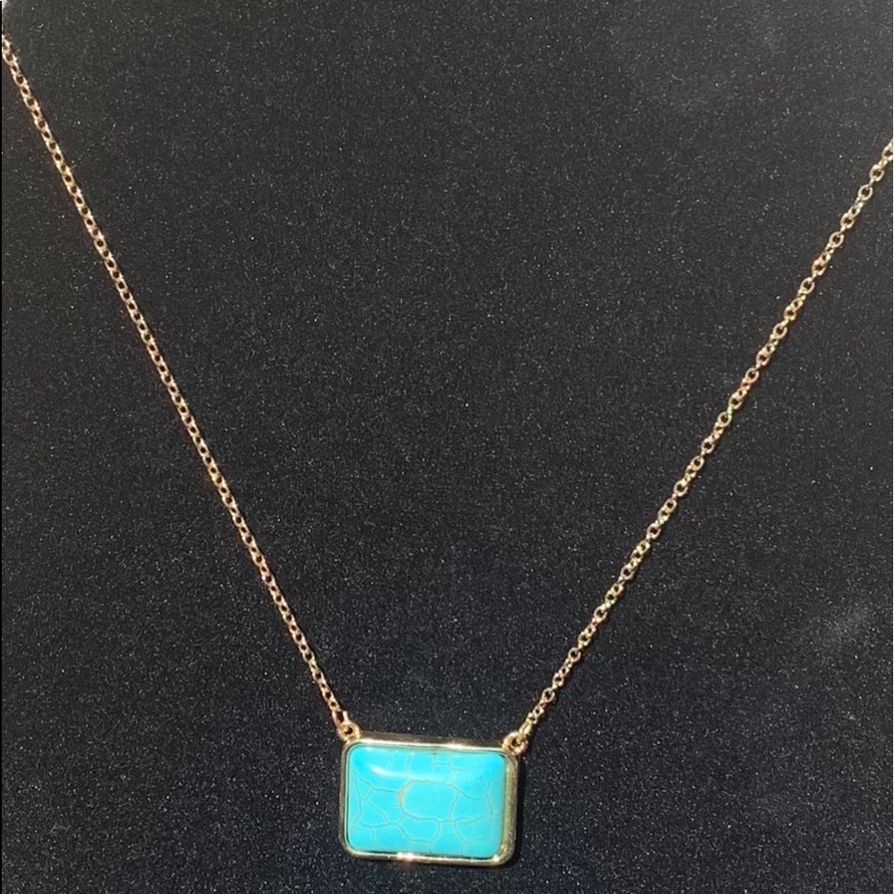 Gold tone 16” to 20” necklace with turquoise color stone. Heavy stone. Pre Loved